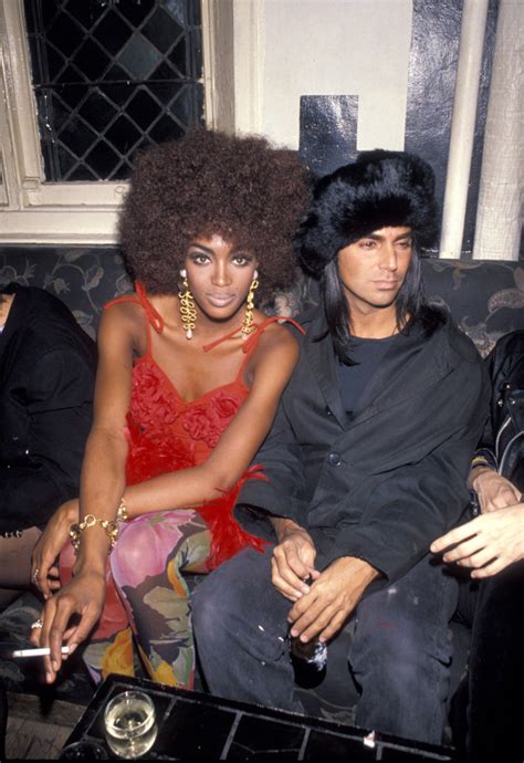 Photographer Steven Meisel, a model and Naomi 